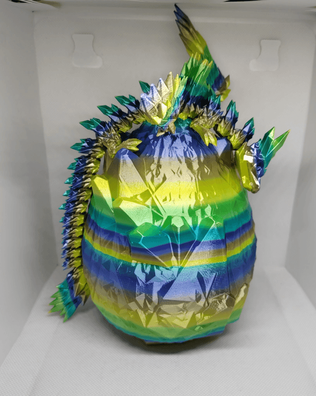 Oeuf de dragon cristal avec ailes